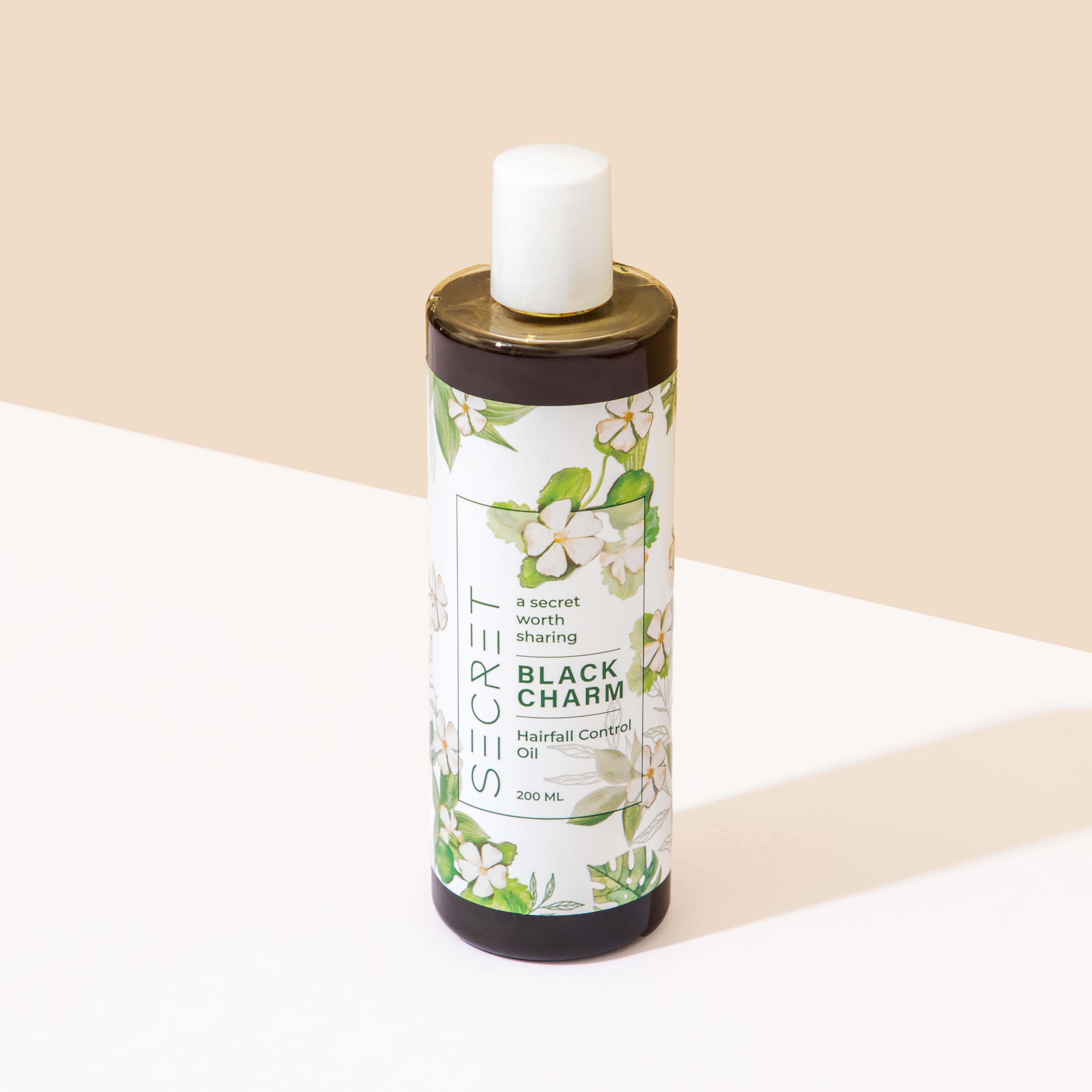 The Secret  Care Black Charm Hair Oil